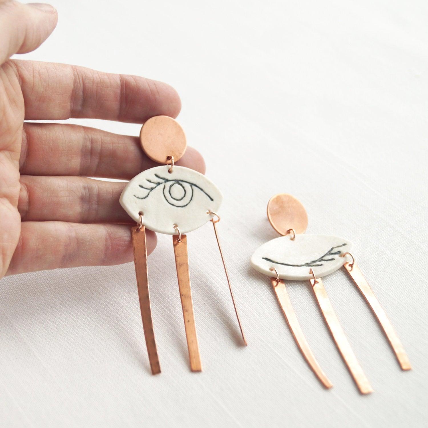 WINK, statement earrings, winking eye earrings, white porcelain, copper earrings, 7th anniversary gift, rose gold earrings, V