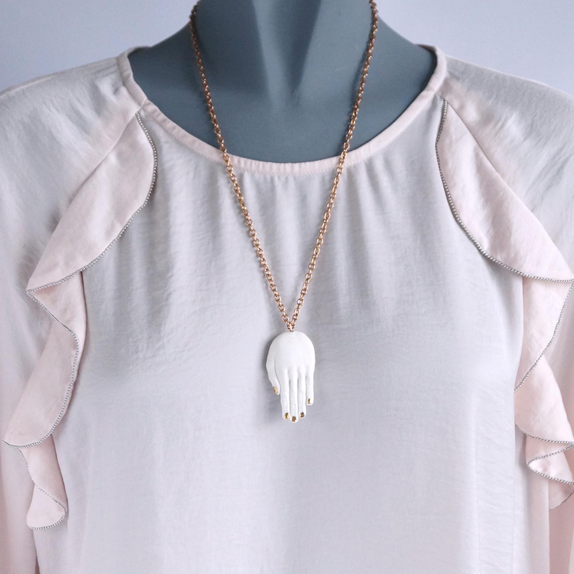 sculpted porcelain hand, hand sculpture, hand pendant, hand necklace, gold lustre porcelain, rose gold necklace, rose gold li