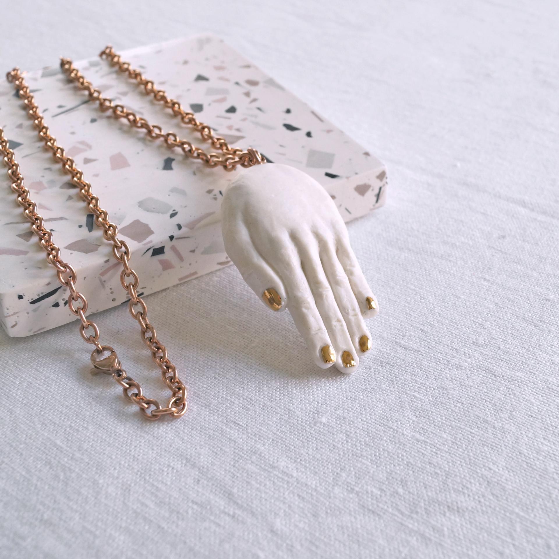 sculpted porcelain hand, hand sculpture, hand pendant, hand necklace, gold lustre porcelain, rose gold necklace, rose gold li