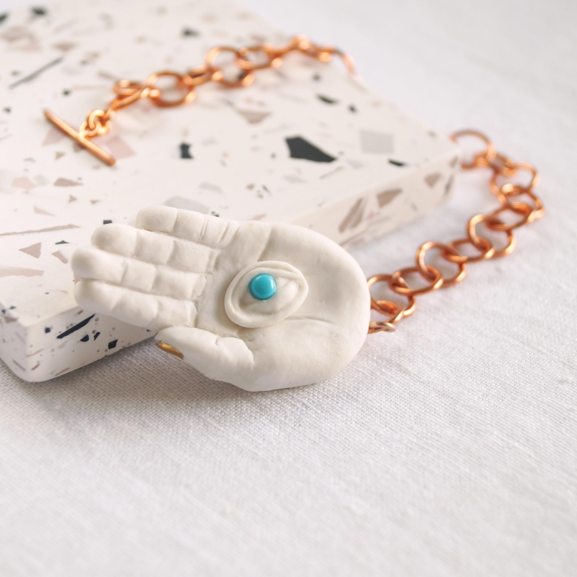 Mystic hand pendulum, EYE LIGHT pendulum, white porcelain hand, turquoise eye, copper chain, toggle clasp, Vanillakiln, coppe