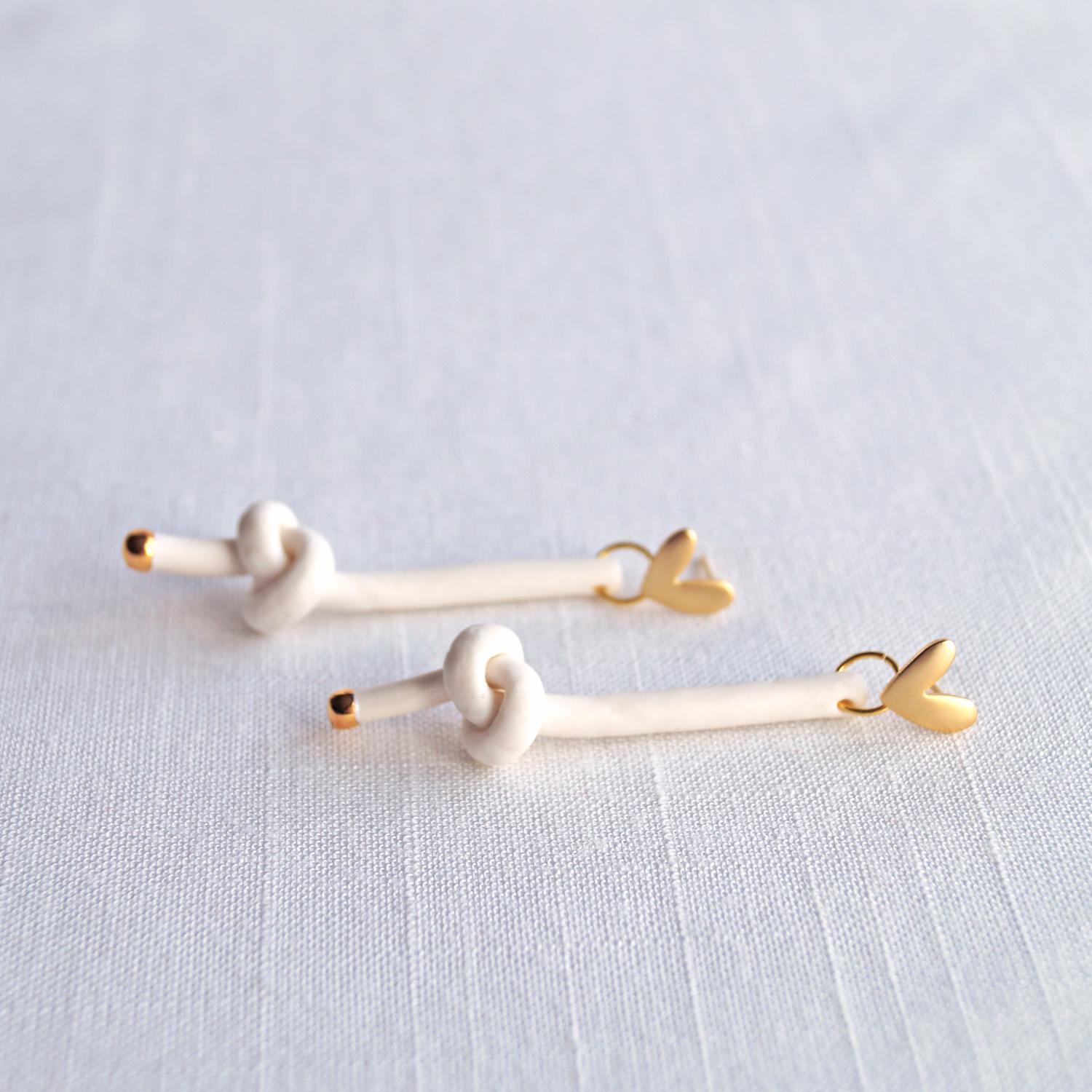 Love KNOT earrings, tying the knot earrings, porcelain knot earrings, white porcelain earrings, gold heart earrings, gold lus